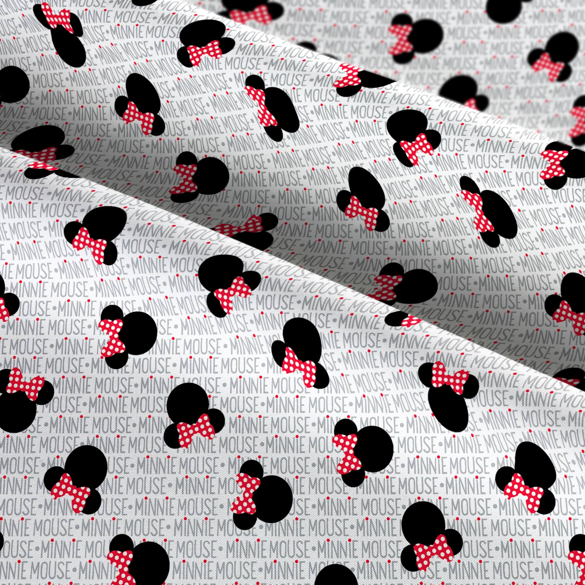 Springs Creative Disney® Minnie Mouse Heads on White Cotton Fabric